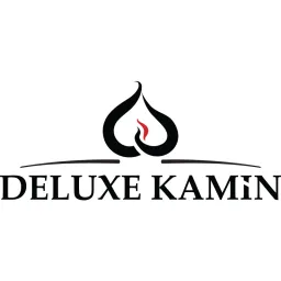 Del&uuml;ks Kamin logo